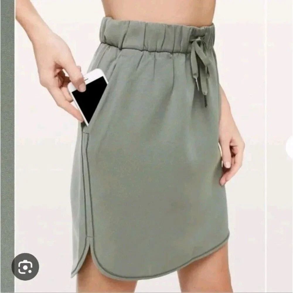 Lululemon Women’s On The Fly Skirt Travel Woven Drawstring Dark Green Size 4